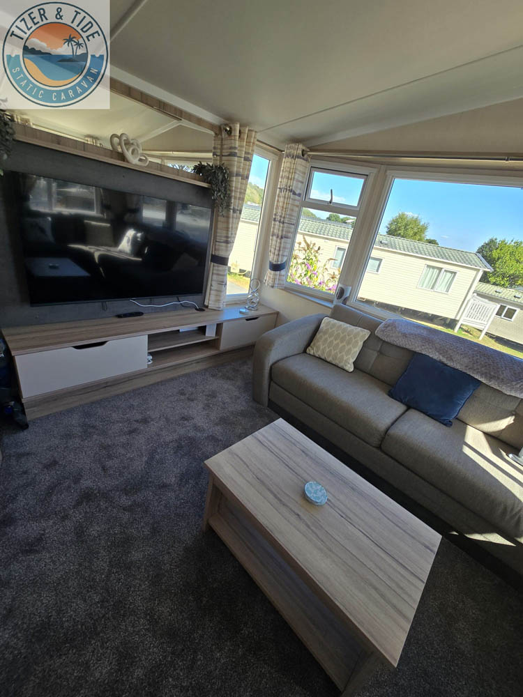 Open-plan living area looking towards the television